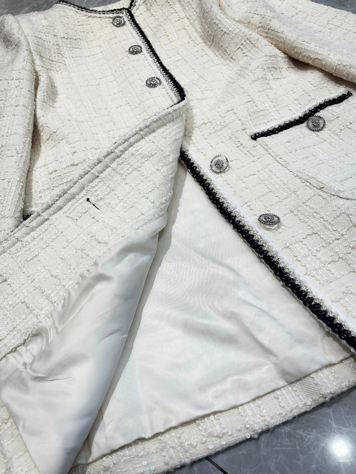 2026 Women Tweed Jacket Mid‑Length Round Neck Weave Fabric Contrast Tape Trim Metal Button Closure