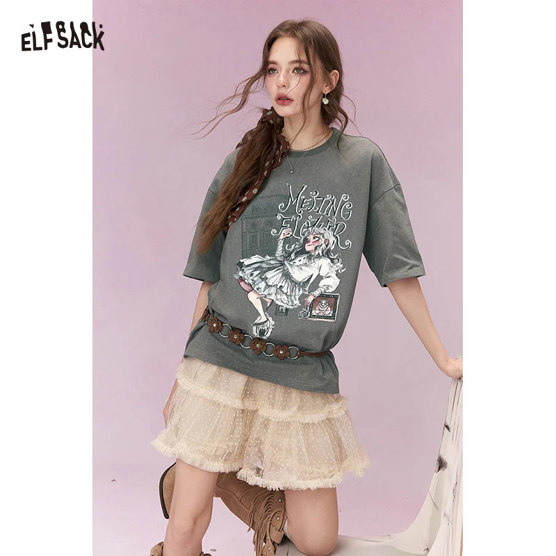 ELFSACK Shiny Glitter Graphic T-Shirt with Silver Foil Print, Loose Fit Casual Tee, Soft Women's Novelty Tops for Daily Wear