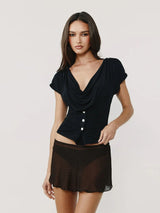 With Jen Off-the-Shoulder Black T-Shirt With a Round Neckline and a Fitted Waist, Featuring an Irregular Cut and Short Sleeves.
