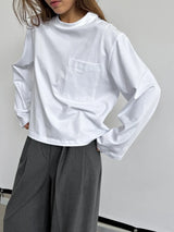 Hirsionsan 2026 New Round Neck Long Sleeved T-shirt for Women, Pure Cotton Pocket, Simple and Casual Instagram Style Short Top
