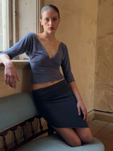 With Jean Misty Blue-Purple Deep V-Neck 3/4 Sleeve Top With Pleated Neckline and a Fitted Short Style Top