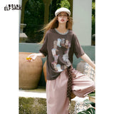 ELFSACK Women's Western Cowboy Boot Graphic T-Shirt with Contrast Crew Neck, Retro Short Sleeve Loose Fit Tee for Summer