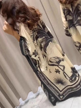 2025 Summer Fashion Series New Women's Loose Print Bohemian Retro V-neck Temperament Beach Sunscreen Skirt